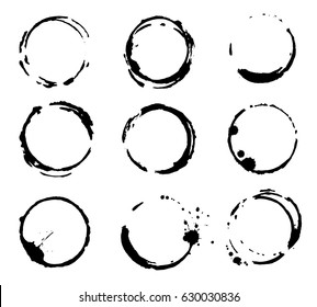 Set of vector black stain circles on white background. Wine, coffee or tea stains