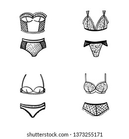 Set of vector bras and panties. Black and white illustration of underwear. Hand drawn lingerie in inky style. Black and white illustration.