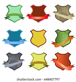 Set of vector colored shields with ribbons. Vector illustration isolated on white background