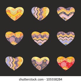 Set of vector colorful hearts on black background