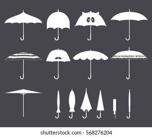 Set of vector cute black and white umbrellas in flat design style. Closed and open fashion icons. Cover accessory. Modern style. Protection from rain and sun