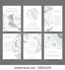 Set of vector design templates. Brochures in random colorful style. Vintage frames and backgrounds. Zentangle designs.