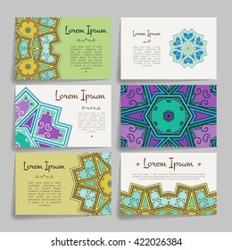 Set of vector design templates. Brochures in random colorful style. Vintage frames and backgrounds. Business card with floral circle ornament. Mandala style.