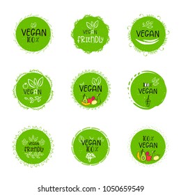 Set of vector eco, bio green logo or sign. Vegan  healthy food badge, tag for cafe, restaurants, products packaging. Hand drawn leaves, branches, plant elements with lettering. Circle organic design.