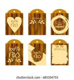 Set of vector environmental labels with wooden background