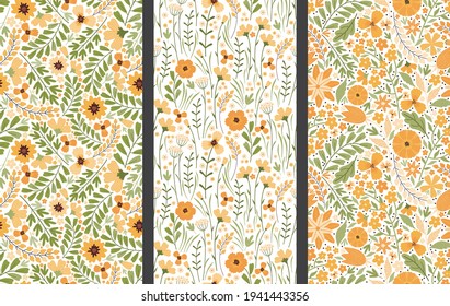 Set of vector floral seamless patterns. Blooming summer meadow. Colorful different yellow wildflowers, leaves and stems on a white background. Liberty millefleurs. Hand drawn vector illustration