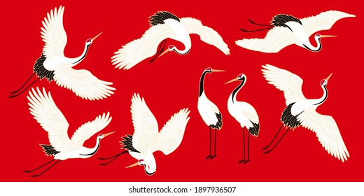 Set of vector flying japanese cranes