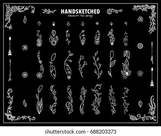 Set of vector forest elements. Hand drawn wild flowers, grass, herbs, weeds, branches, leaves, reeds, arrows and wave ornate corners. Abstract signs and symbols, black and white chalkboard design