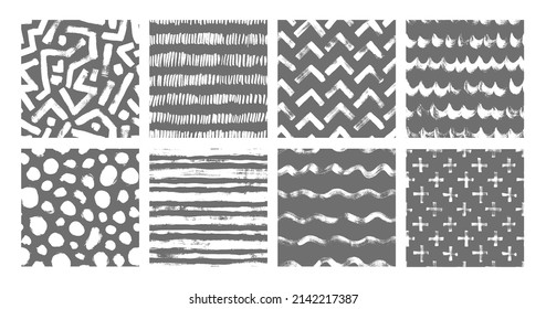 Set of vector geometric seamless pattern. Hand drawn grunge textures made with ink. Abstract background with brush strokes. Wavy lines, chevron, black dots, crosses and labyrinth. Ink brush scribbles.