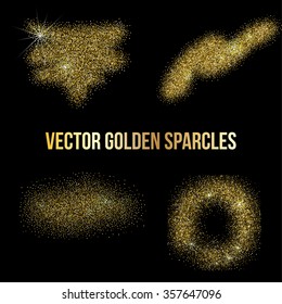Set of vector glittering golden elements for your design. Vector abstract golden sparkles.