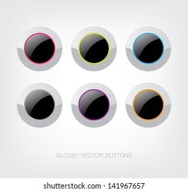 A set of vector glossy plastic buttons with colorful details