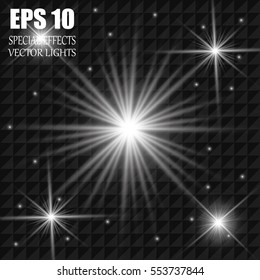Set of Vector glowing light effect stars bursts with sparkles on transparent background. 