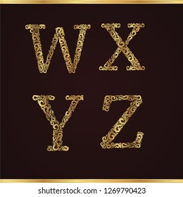 Set of vector gold letters in vintage style  on brown background