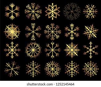 Set of vector gold snowflakes - abstract geometric shapes for Christmas holiday designs