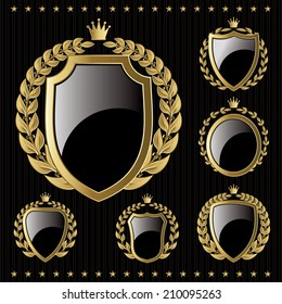 set of vector golden emblem with shield and wreaths