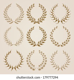 Set of vector golden laurel wreaths. Page decoration, floral elements. Vector illustration in vintage style.