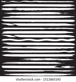 Set of vector grunge brushes. White paint strokes on black background. Abstract handmade lines