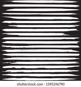 Set of vector grunge brushes. White paint strokes on black background. Abstract handmade lines