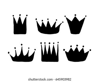 Set of vector hand drawn crowns with paint texture.
