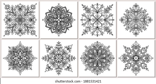 Set of vector hand drawn mandalas isolated on white background. Mandala coloring page. Valentine's day greeting card. Outline mandala of hearts.