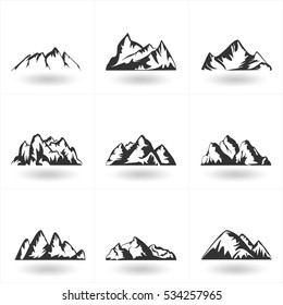 Set of vector hand drawn Mountains silhouette icons for logo design elements. Tourism, Camping, Climbing or hiking badges labels,  Ride and Snowboarding symbols. 
