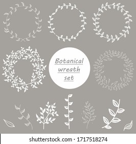 Set of vector hand drawn wreaths. Leaves and flowers of a garland. Romantic floral design elements.