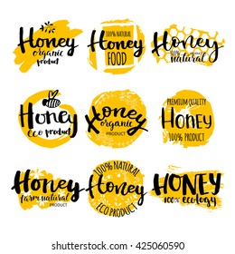 Set of vector hand drawn writing honey logo, label, badge in modern ink calligraphy style. Natural bee products. Yellow spot of honey with the bee and honeycomb logo