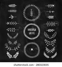 Set of vector handdrawn laurels and wreaths,  nature, floral doodle collection on chalkboard. Decoration elements for design invitation, wedding cards, valentines day, greeting cards