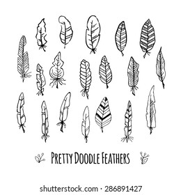 Set of vector hand-drawn stylized feathers. Doodle