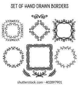 set of vector hand-drawn swirl borders and frames isolated