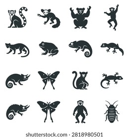 A set of vector icons depicting various tropical animals including lemurs, chameleons, frogs, butterflies, and insects in minimalist flat black silhouettes.