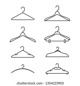 set of vector illustration hanger for clothing and fashion silhouette flat design style