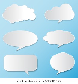 set of vector illustration of white paper rounded speech bubbles on sky background
