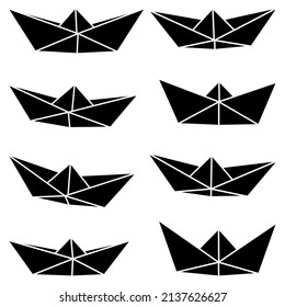 Set of vector illustrations of paper boat icons. Silhouette simple craft paper boat isolated on white background. Icon symbol of travel and sea.