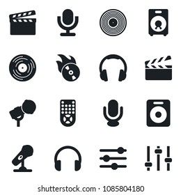 Set of vector isolated black icon - clapboard vector, vinyl, flame disk, microphone, remote control, headphones, speaker, tuning