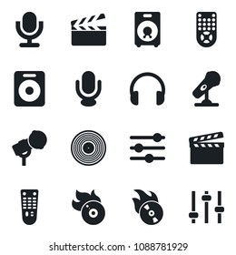 Set of vector isolated black icon - clapboard vector, vinyl, flame disk, microphone, remote control, headphones, speaker, tuning