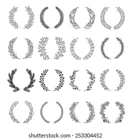 Set of vector laurel wreaths. Vintage designs. Leaves and branches round frames. Hand drawn sketch style.