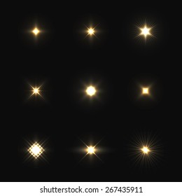 Set of vector lens flares isolated on black background.