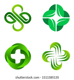 Set of vector logo pharmacy. Abstract green cross. Eco, bio, organic emblem.