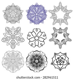 Set of vector monochrome flower mandala on a contrasting background. Snowflake