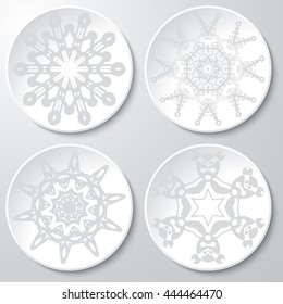 Set of vector monochrome icons. Set of vector round ornamental icons. Collection of geometric patterns on the plates.