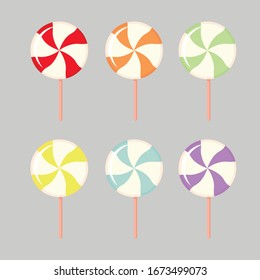 Set of vector multicolored lollipops. round striped lollipops. multicolored flat candy on a stick icons.