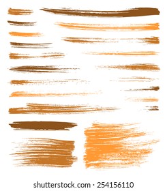 set of vector orange quality handmade brush splatters