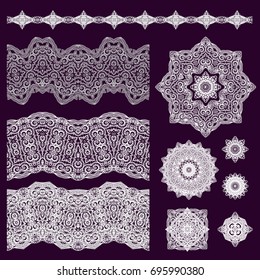 Set of vector ornaments - rosettes and lace borders on dark background