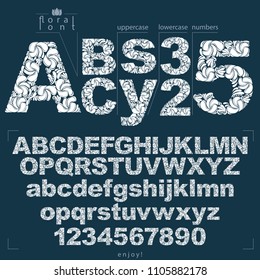 Set of vector ornate letters and numbers, flower-patterned typescript. Black and white characters created using herbal texture.