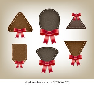 A set of vector promo leather suede textured banners with red bow knots