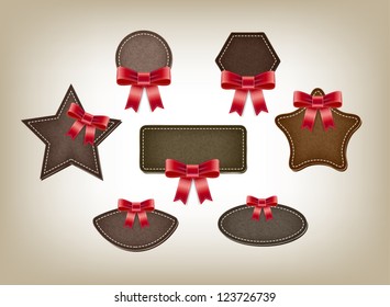 A set of vector promo leather suede textured banners with red bow knots