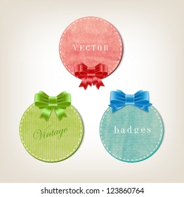 A set of vector retro elegant paper textured round banners / greeting cards decorated with silky ribbon bow knots