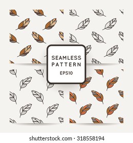 Set of vector seamless pattern of feathers. Doodle. Zentangle