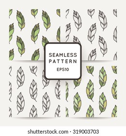 Set of vector seamless pattern of feathers. Doodle. Zentangle